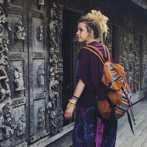 purple flowy thai top